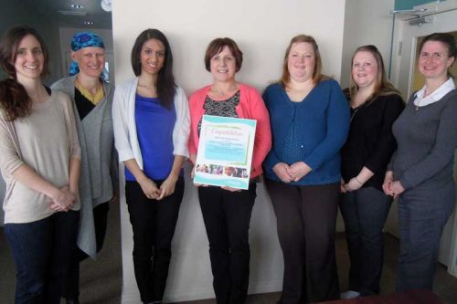 staff at the Sharbot Lake Family Health Team l-r Liz Bigelow, Laura Baldwin, Salam Iqbal, Brenda Bonner, Ashley Klatt and Robyn Tatton with Darlene Johnson of KLF&A Public Health are recognized for the success of the 18 Month Well Baby Visit program